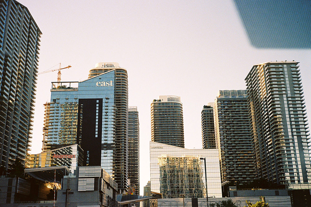 Downtown towers under construction with cranes on the skyline