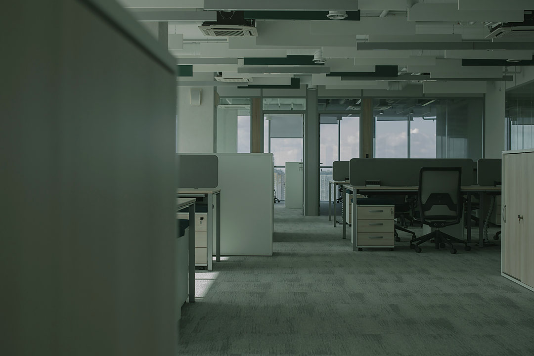 Vacant office suite interior with glazed partitions